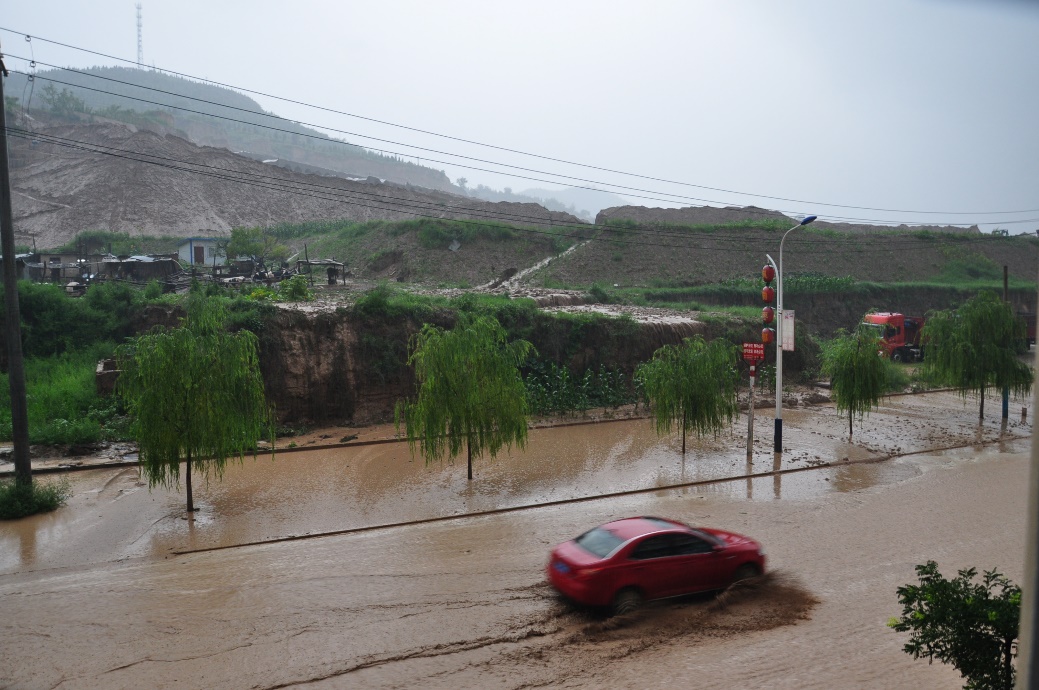 A historic rainstorm caused severe flooding on streets in Yulin, Shaanxi Province on 25 July, 2013.jpg